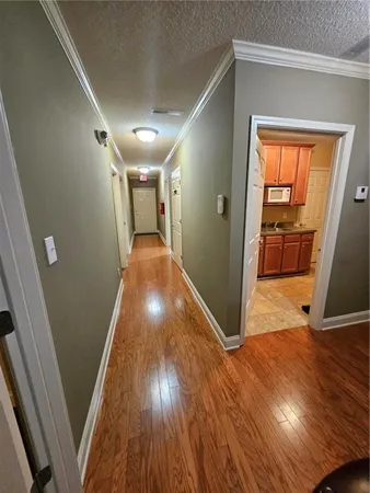 a view of entryway with wooden floor