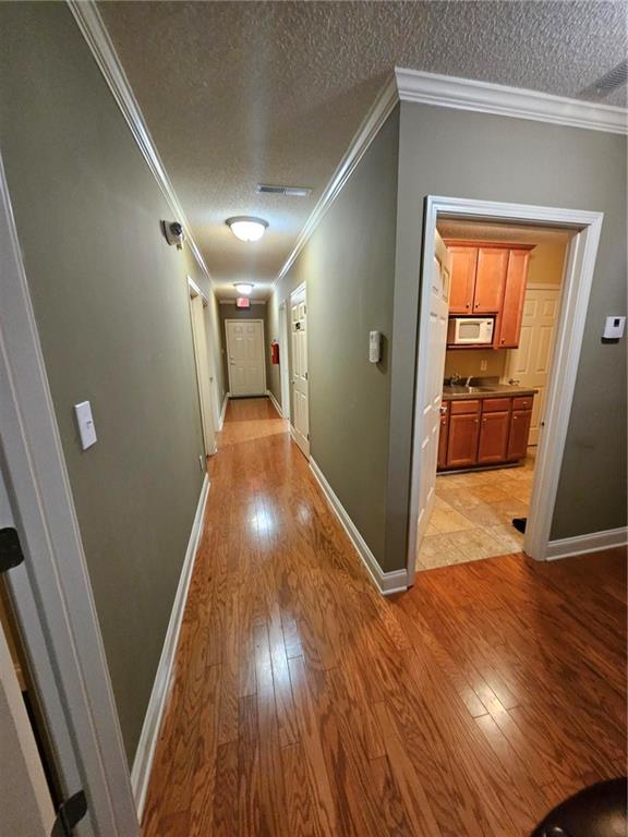 101 Devant Street, Unit 901 Fayetteville, GA 30214 - Photo 7 of 14 a view of entryway with wooden floor