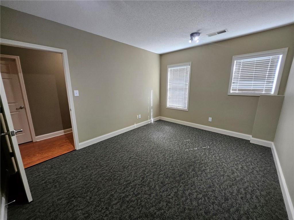101 Devant Street, Unit 901 Fayetteville, GA 30214 - Photo 9 of 14 a view of room with window