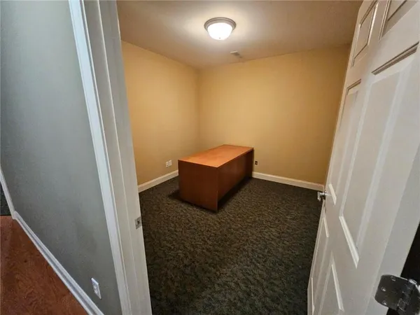 a room with a wooden door