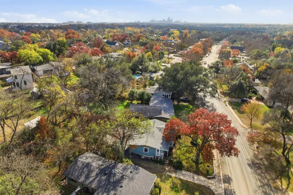 a view of a lake in middle of the town