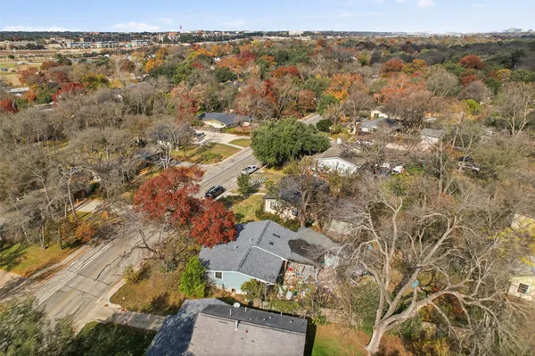 an aerial view of residential building with parking space