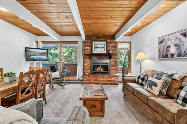 a view of a living room and dining room