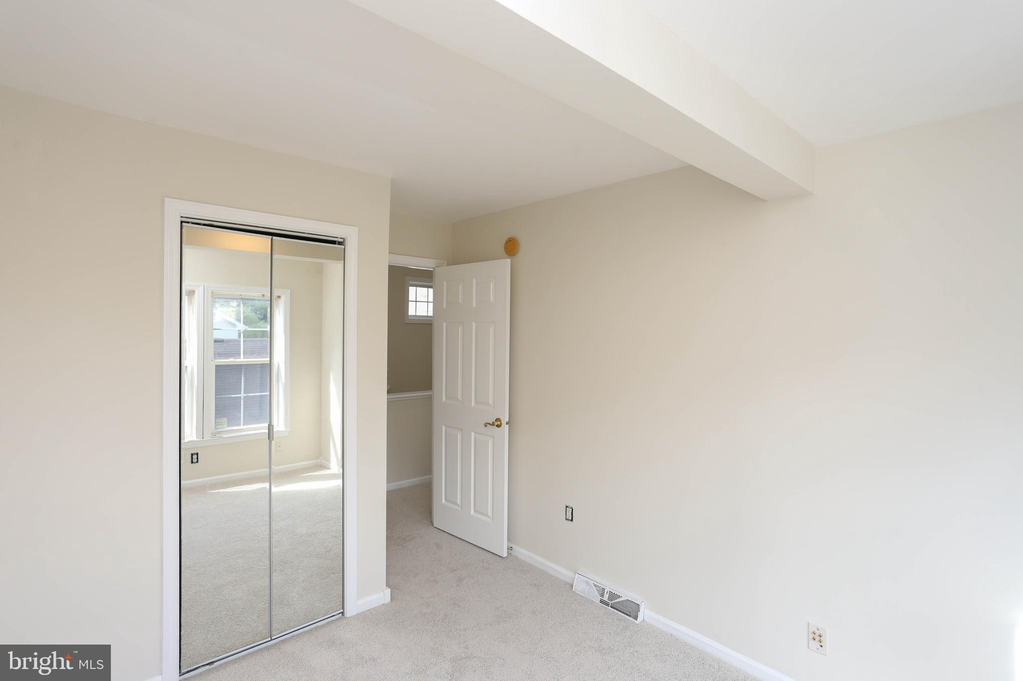 7629 Bluff Point Lane Elkridge, MD 21075 - Photo 12 of 31 an empty room with closet