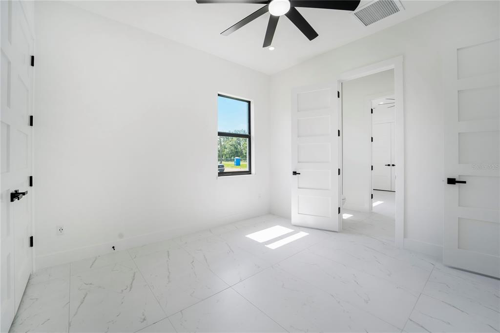 14080 Sydney Road Dover, FL 33527 - Photo 32 of 51 a view of an empty room