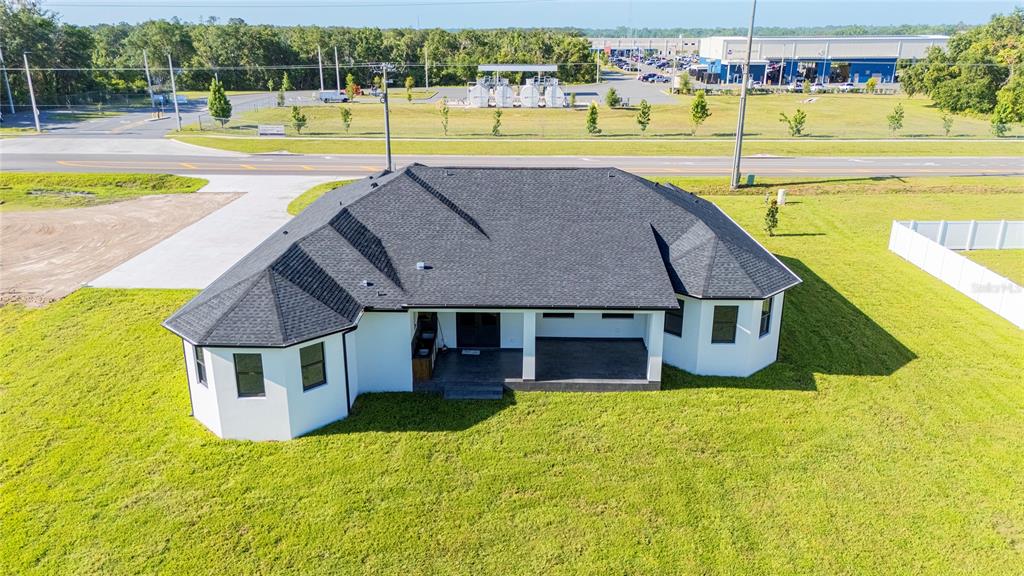 14080 Sydney Road Dover, FL 33527 - Photo 43 of 54 a view of a house with a swimming pool