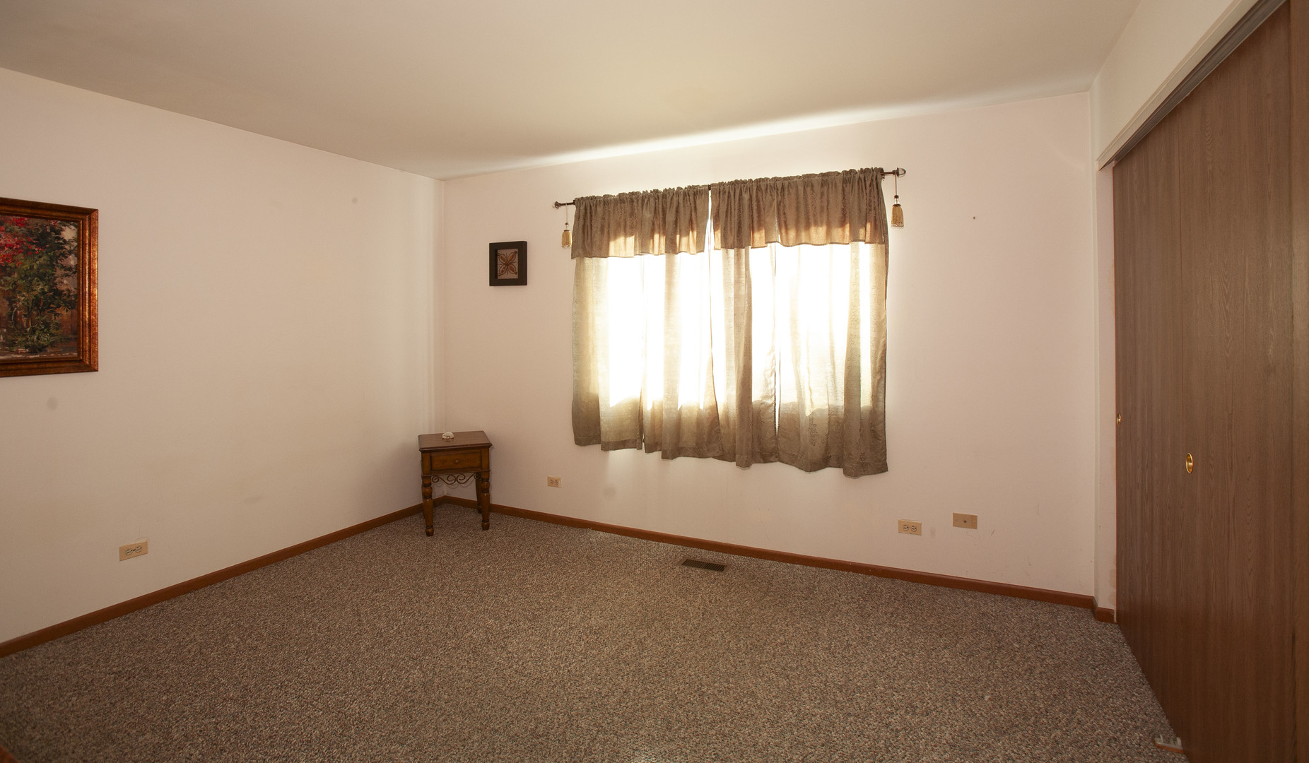 662 Dover Drive Elgin, IL 60120 - Photo 12 of 23 a view of an empty room with a window