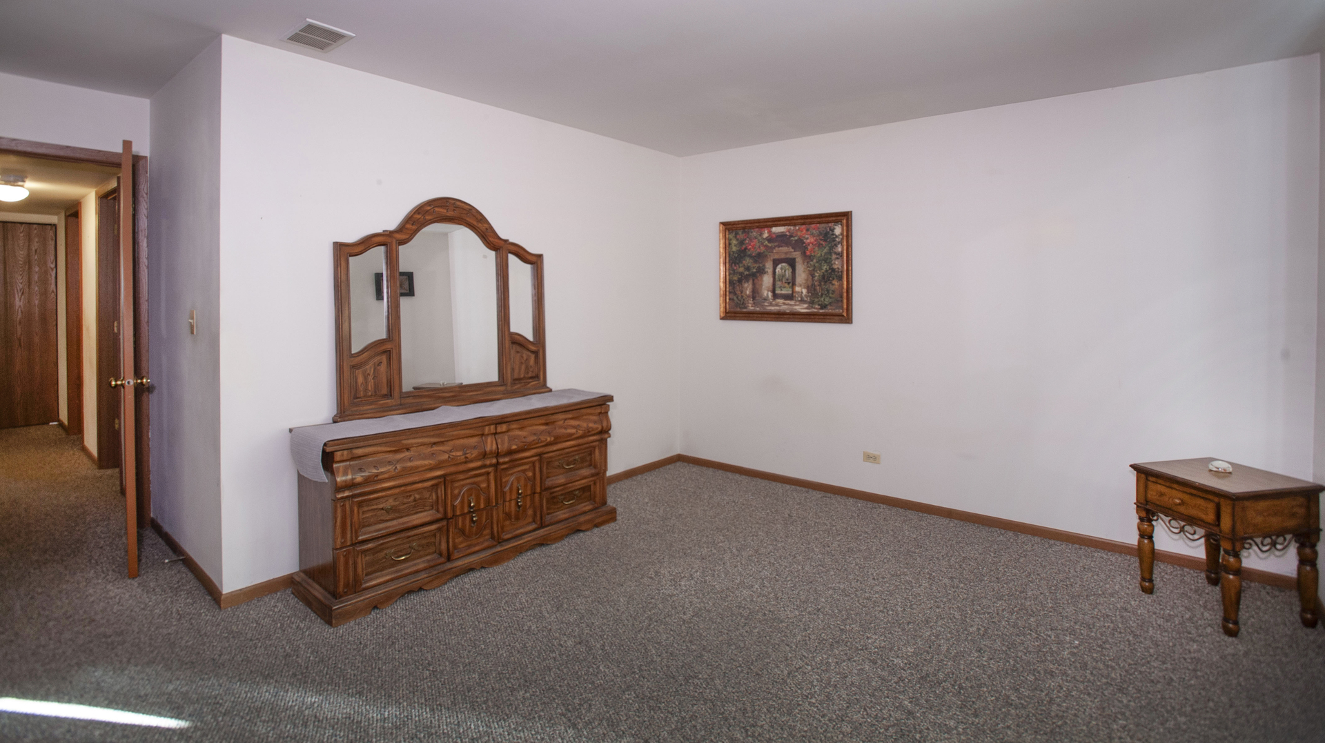 662 Dover Drive Elgin, IL 60120 - Photo 13 of 23 a room with furniture and a dresser