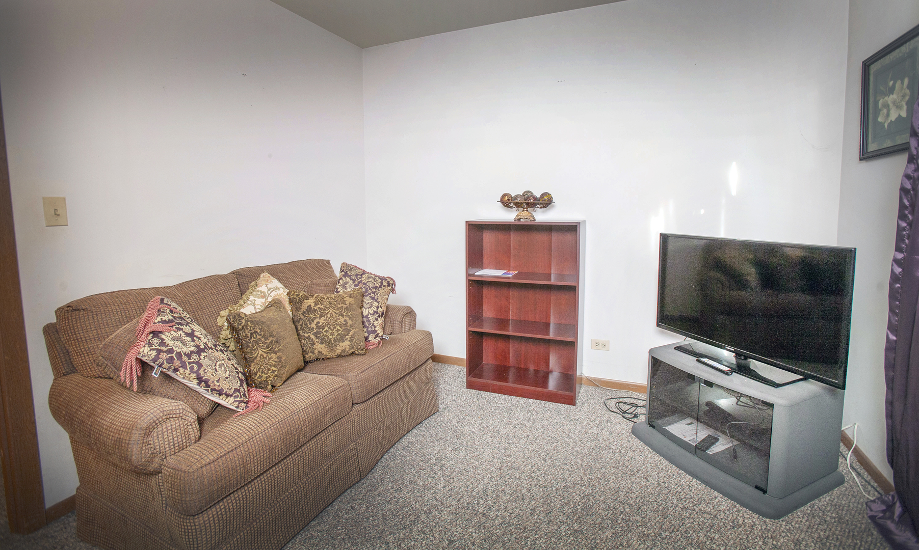 662 Dover Drive Elgin, IL 60120 - Photo 15 of 23 a living room with furniture and a flat screen tv