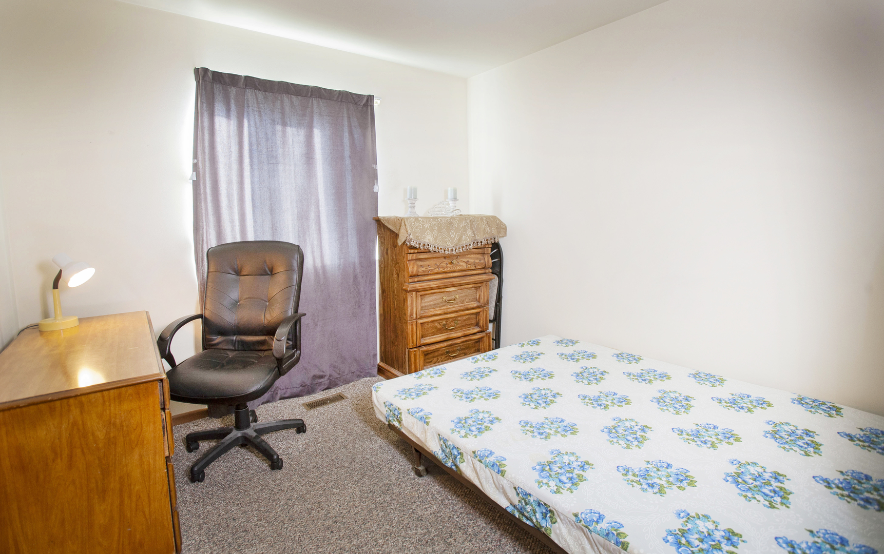 662 Dover Drive Elgin, IL 60120 - Photo 17 of 23 a bedroom with a chair and a window