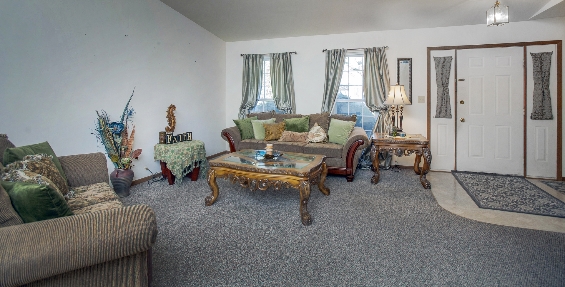 662 Dover Drive Elgin, IL 60120 - Photo 20 of 23 a living room with furniture and a rug