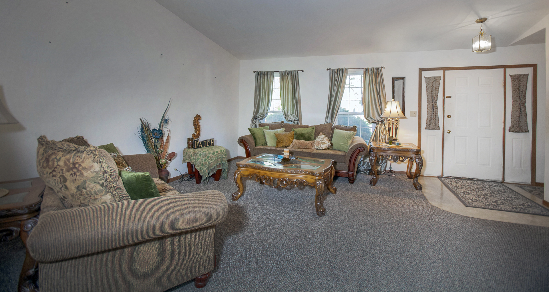 662 Dover Drive Elgin, IL 60120 - Photo 6 of 23 a living room with furniture and a table