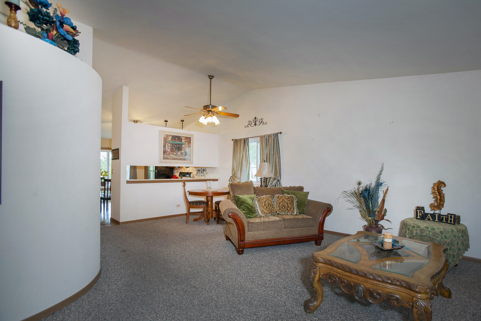 662 Dover Drive Elgin, IL 60120 - Photo 7 of 23 a living room with furniture and a chandelier