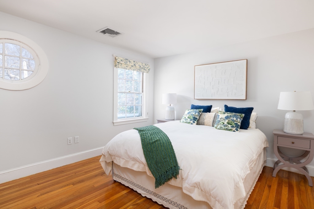 18 Moffat Road Newton, MA 02468 - Photo 12 of 23 a bedroom with a bed and a window