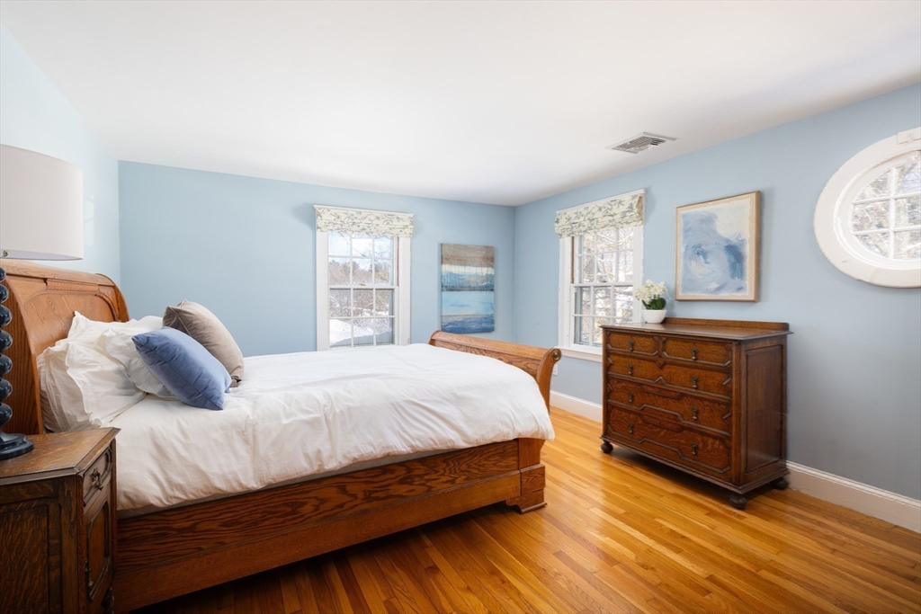 18 Moffat Road Newton, MA 02468 - Photo 13 of 23 a bedroom with a bed and a dresser