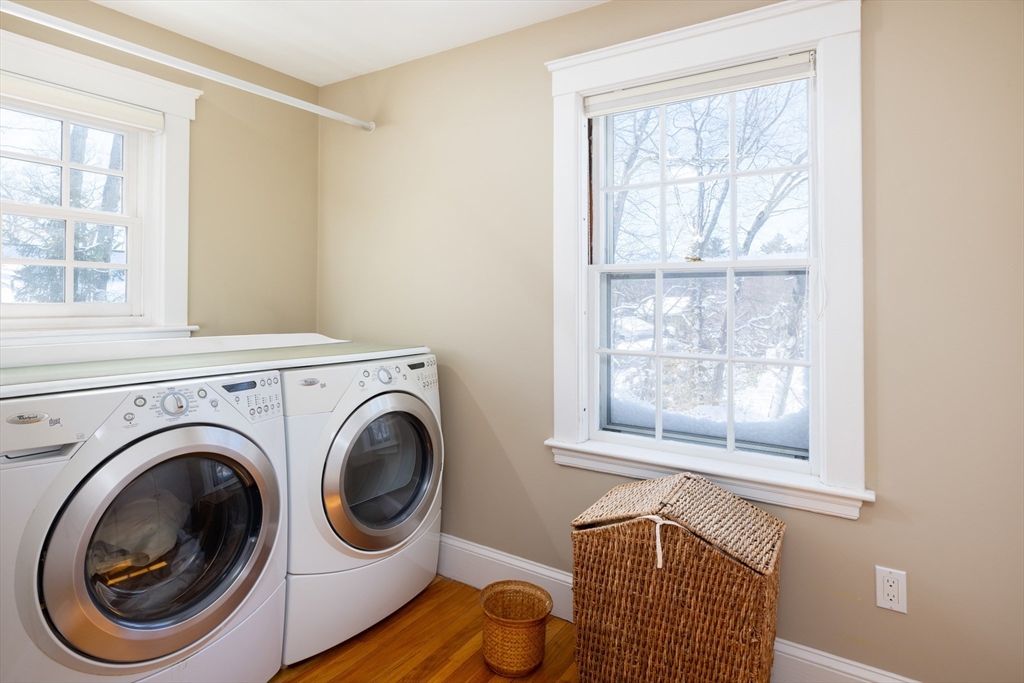 18 Moffat Road Newton, MA 02468 - Photo 15 of 23 a utility room with dryer and windows