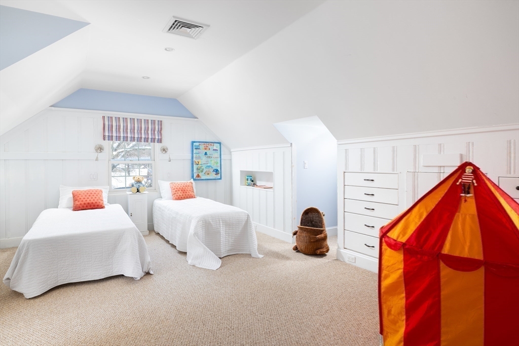 18 Moffat Road Newton, MA 02468 - Photo 17 of 23 a bedroom with bed and a window