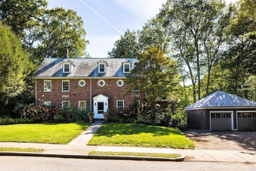 18 Moffat Road Newton, MA 02468 - Photo 23 of 23 a front view of house with yard and trees in the background