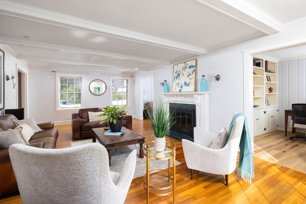 18 Moffat Road Newton, MA 02468 - Photo 4 of 23 a living room with furniture and a fireplace
