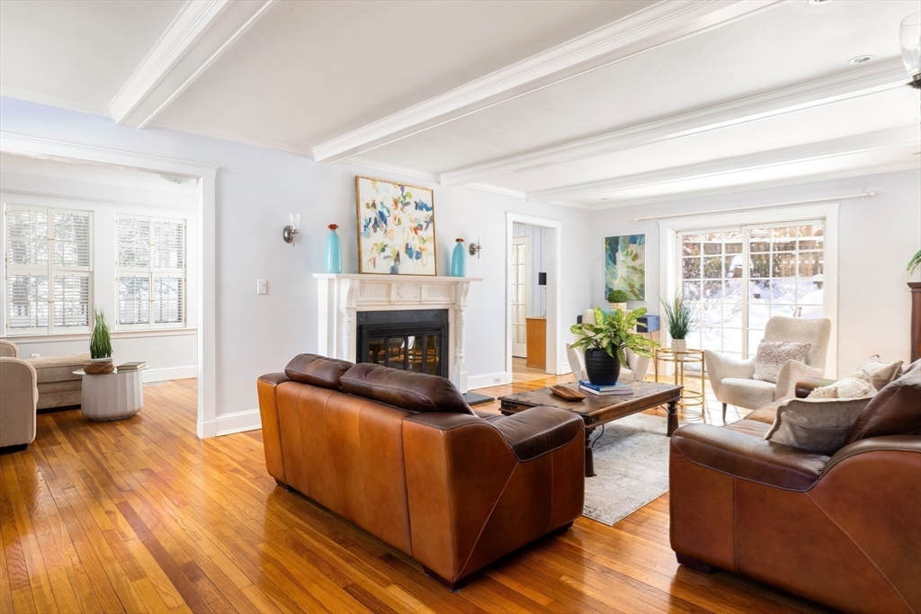 18 Moffat Road Newton, MA 02468 - Photo 5 of 23 a living room with furniture and a fireplace