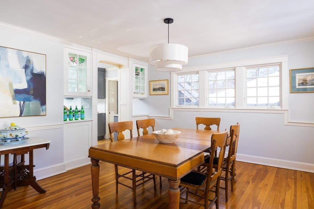 18 Moffat Road Newton, MA 02468 - Photo 6 of 23 a view of a dining room with furniture window and wooden floor