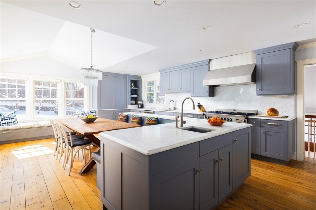 18 Moffat Road Newton, MA 02468 - Photo 9 of 23 a kitchen with a sink a stove and cabinets