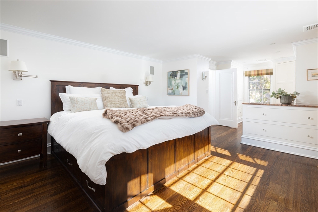 18 Moffat Road Newton, MA 02468 - Photo 10 of 23 a bedroom with a bed and a dresser