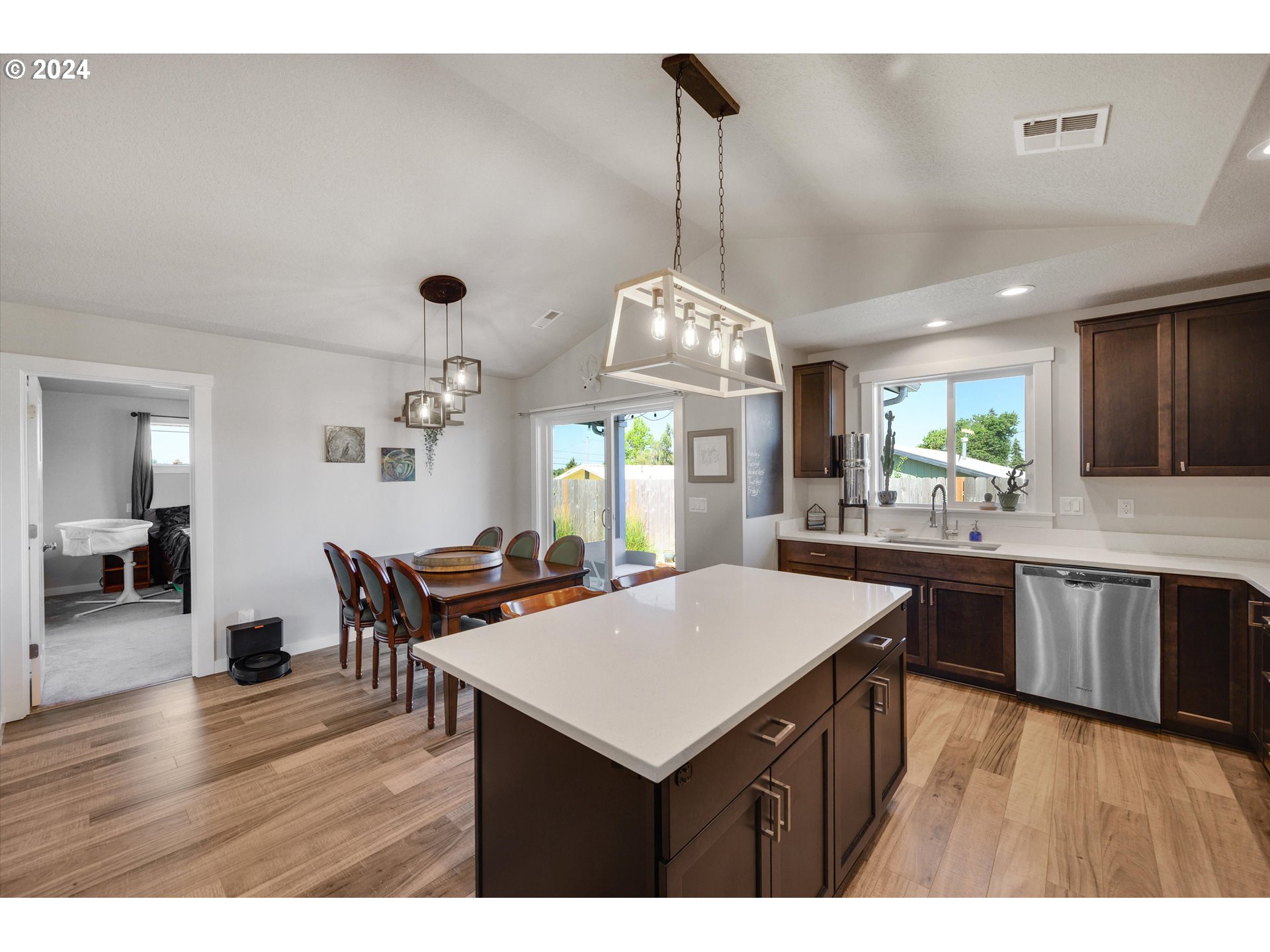 1326 Southwest 9th Street Dallas, OR 97338 - Photo 11 of 32 a kitchen with a dining table and chairs