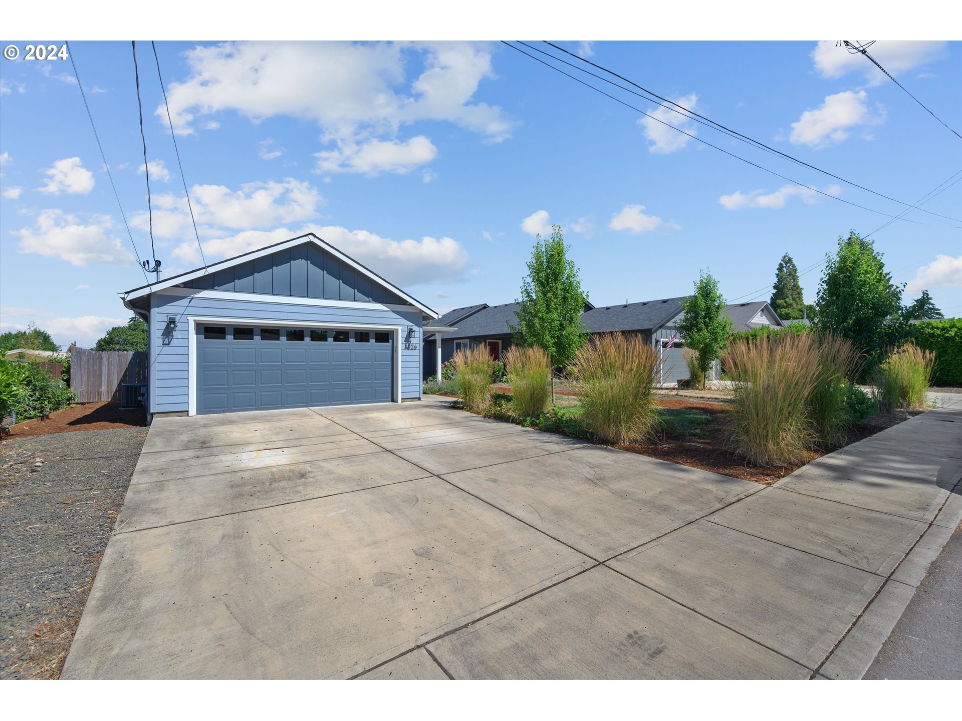 1326 Southwest 9th Street Dallas, OR 97338 - Photo 2 of 32 a front view of a house with a yard