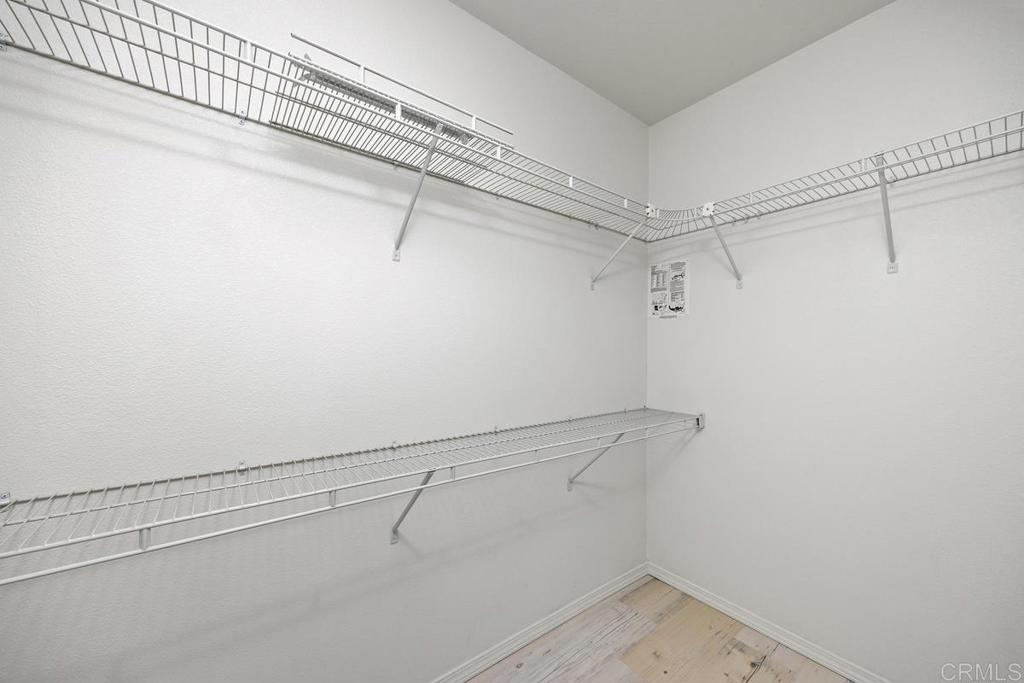 5144 Don Ricardo Drive Carlsbad, CA 92010 - Photo 17 of 34 a view of a room with racks on the wall
