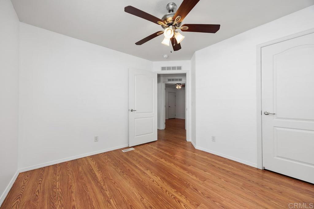 5144 Don Ricardo Drive Carlsbad, CA 92010 - Photo 18 of 34 wooden floor in an empty room