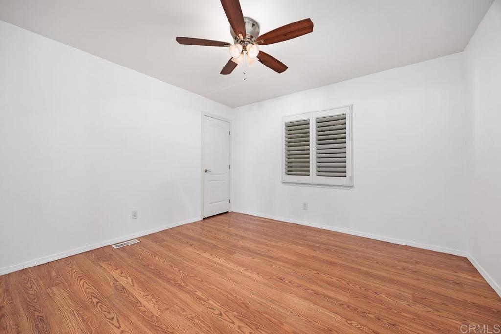 5144 Don Ricardo Drive Carlsbad, CA 92010 - Photo 19 of 34 wooden floor in an empty room
