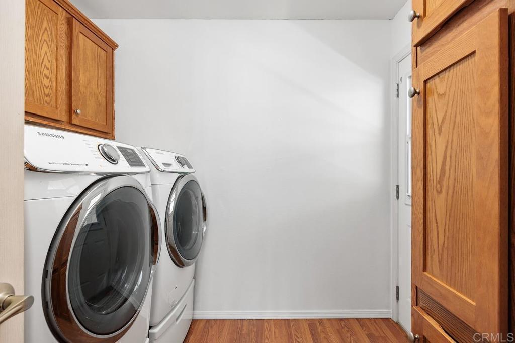 5144 Don Ricardo Drive Carlsbad, CA 92010 - Photo 21 of 34 a utility room with dryer and washer