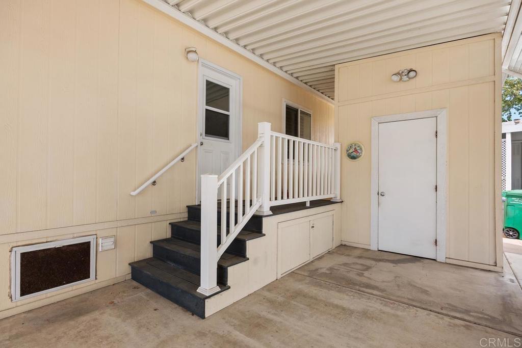 5144 Don Ricardo Drive Carlsbad, CA 92010 - Photo 22 of 34 a view of entryway and hall with wooden floor