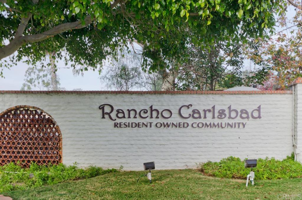 5144 Don Ricardo Drive Carlsbad, CA 92010 - Photo 27 of 34 a signage on a brick wall