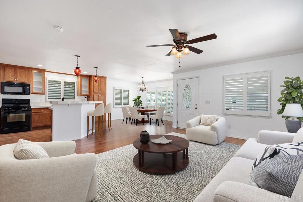 5144 Don Ricardo Drive Carlsbad, CA 92010 - Photo 5 of 34 a living room with furniture and a large window