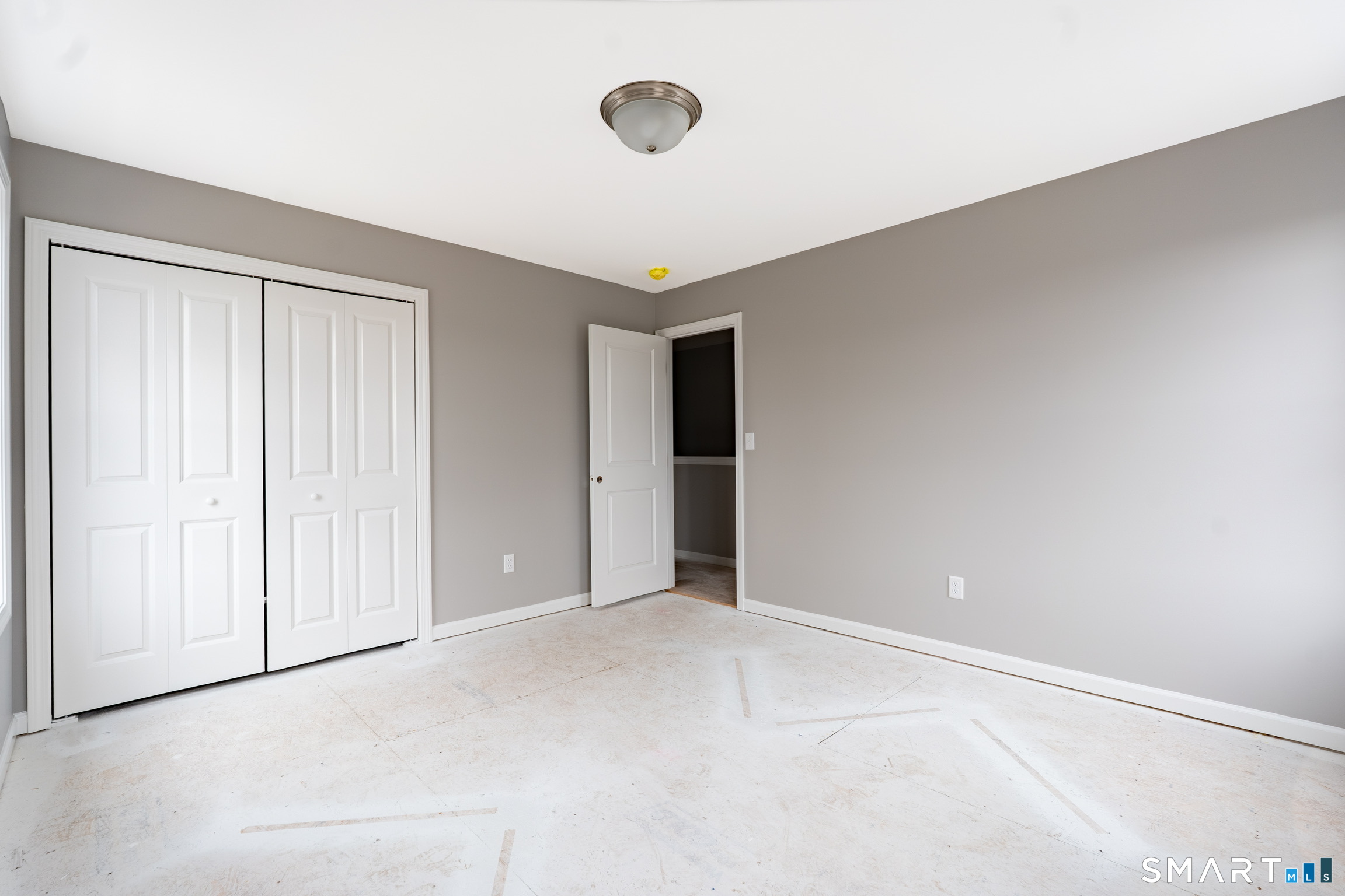 27 Hall Avenue Wallingford, CT 06492 - Photo 11 of 16 an empty room with windows