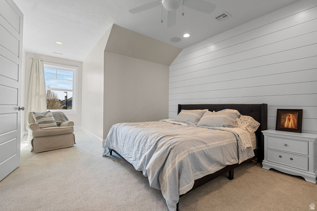 2917 Old Farm Road Washington, UT 84780 - Photo 80 of 105 Bedroom with light carpet, recessed lighting, wooden walls, ceiling fan, and vaulted ceiling
