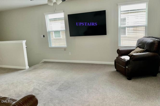 1807 Wrenn Road Durham, NC 27703 - Photo 27 of 43 a living room with furniture and a window