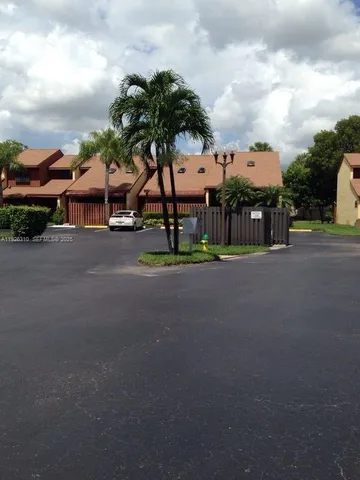 a view of road and trees