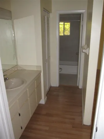 a bathroom with a sink and a bathtub
