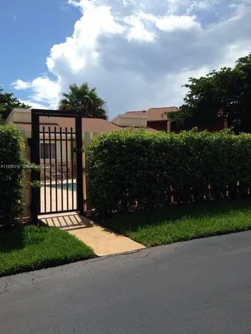 a view of a garden and a yard