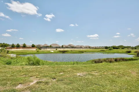 a view of a lake with houses