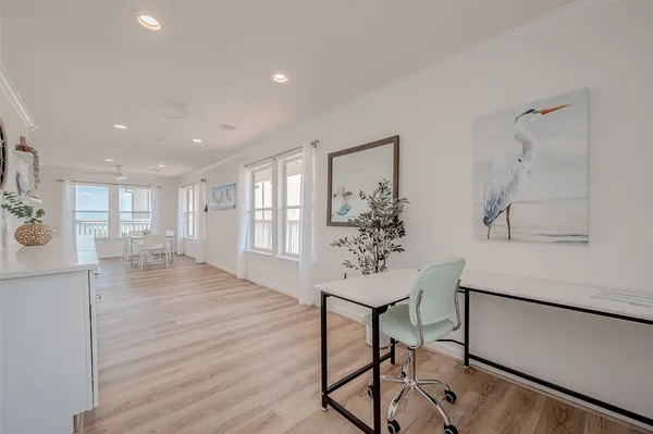 a room with furniture and wooden floor