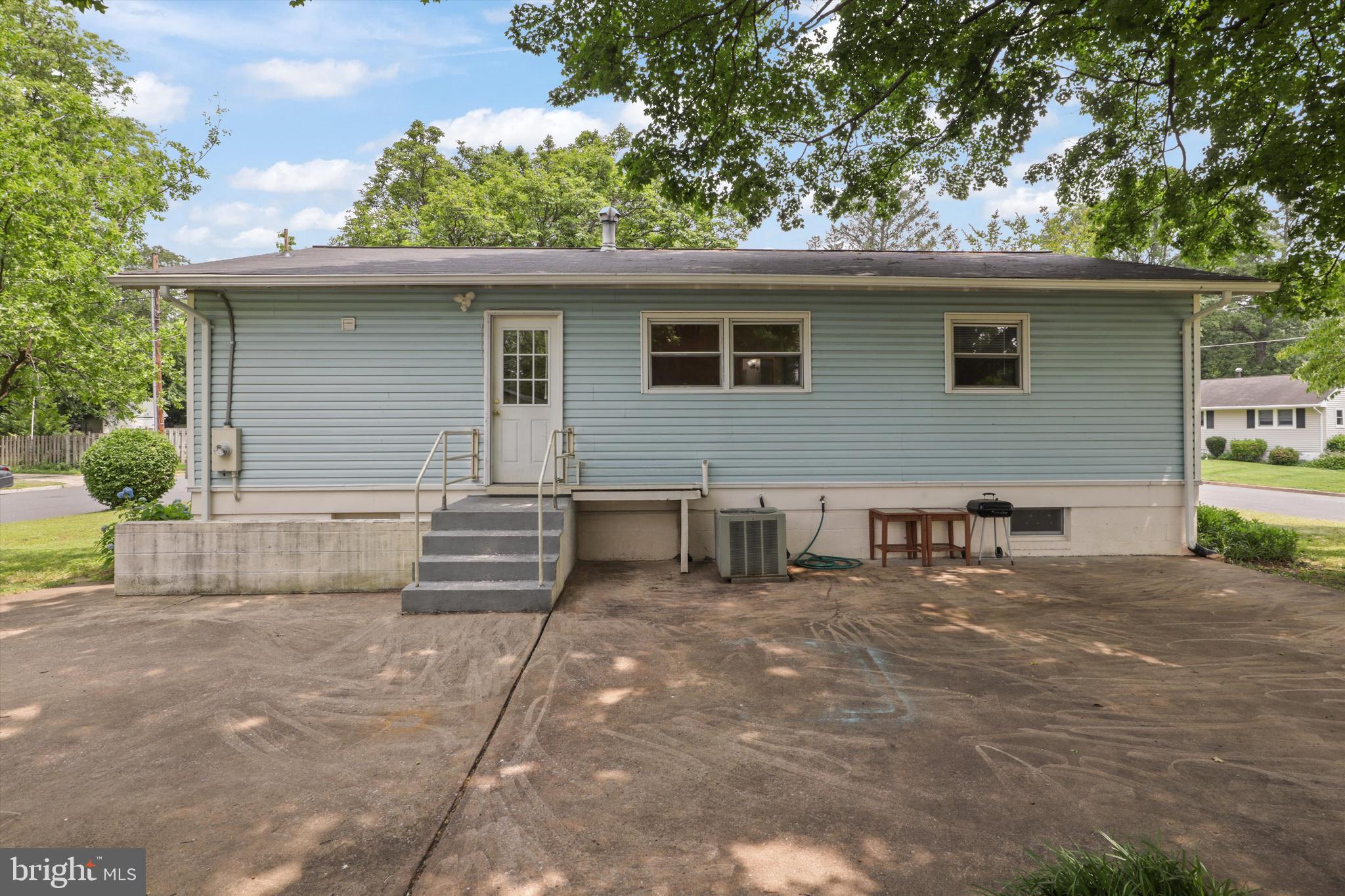 10205 Rodgers Road Fairfax, VA 22030 - Photo 32 of 41 a view of a house with a patio