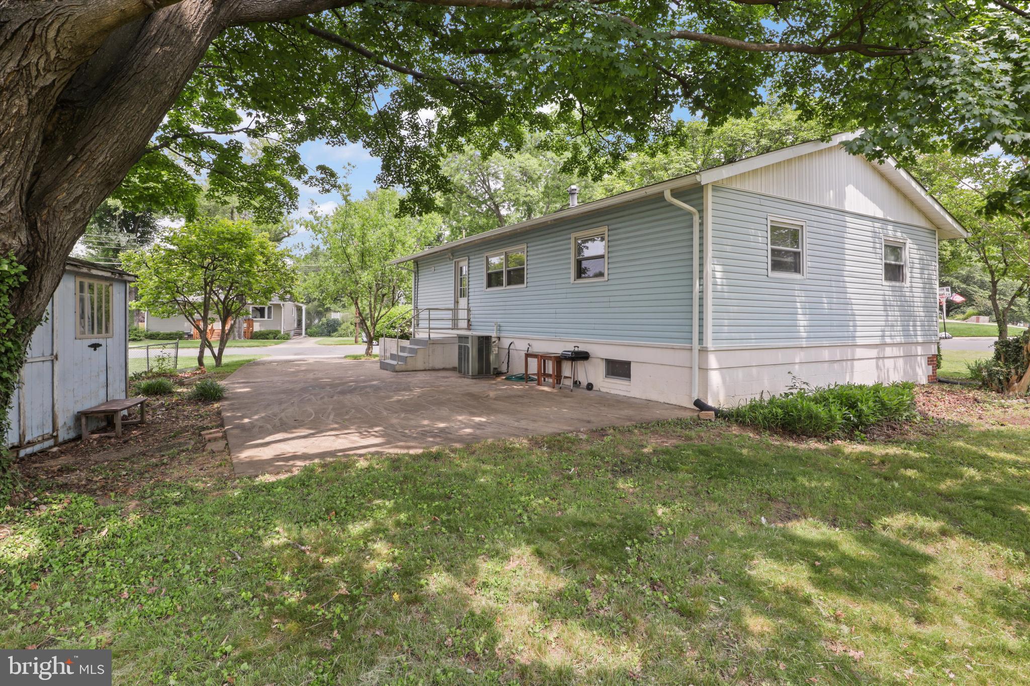 10205 Rodgers Road Fairfax, VA 22030 - Photo 33 of 41 a view of a backyard with a small cabin