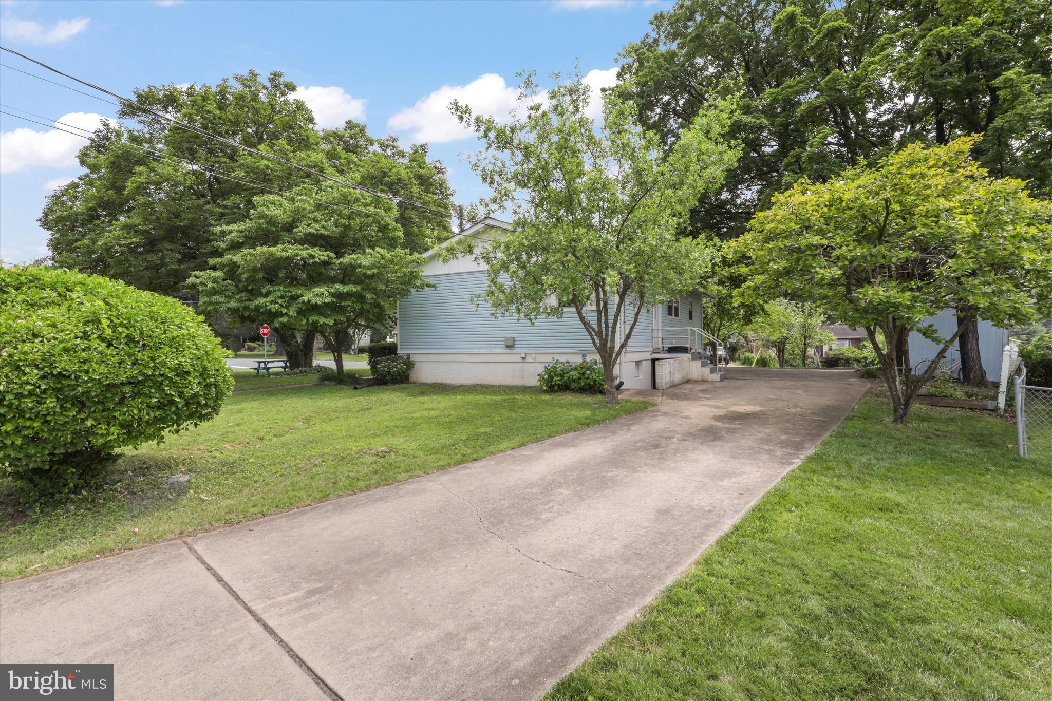 10205 Rodgers Road Fairfax, VA 22030 - Photo 34 of 41 a view of a park with large trees