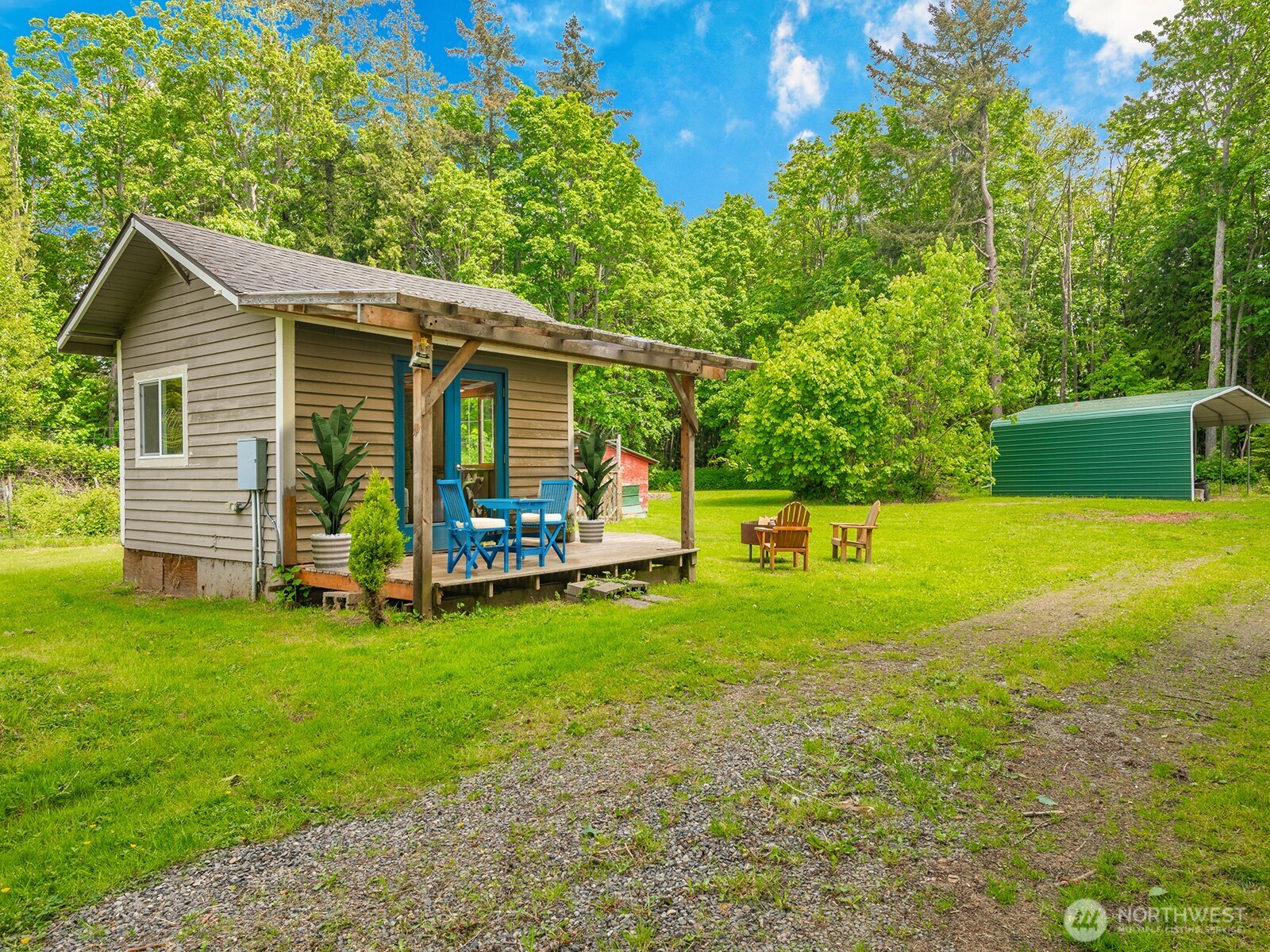 4478 Rural Avenue Bellingham, WA 98226 - Photo 25 of 40 a view of a house with backyard and a tree