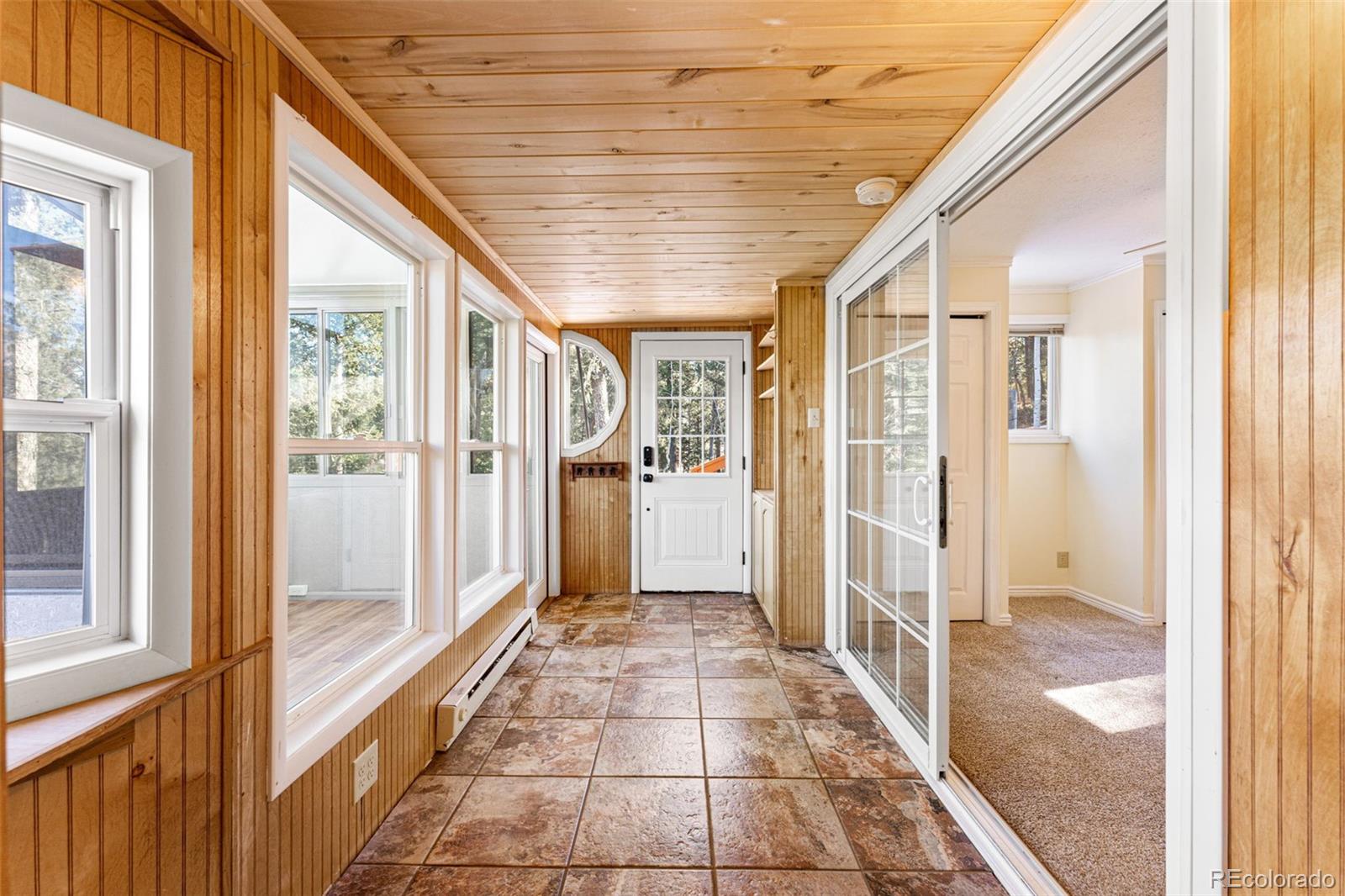 33782 Nova Road Pine, CO 80470 - Photo 14 of 50 a bathroom with a glass door shower and a sink