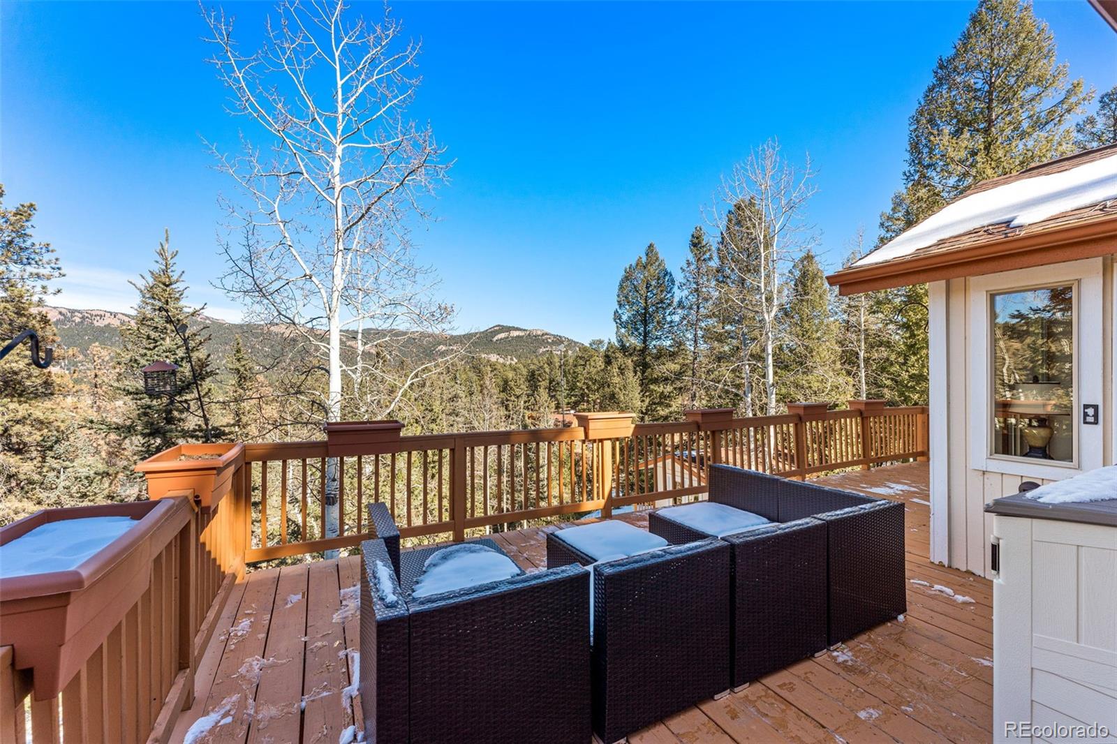 33782 Nova Road Pine, CO 80470 - Photo 24 of 50 a view of a balcony with chairs